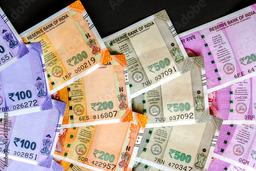 Close up view of brand new indian 50, 100, 200, 500, 2000 rupees banknotes.