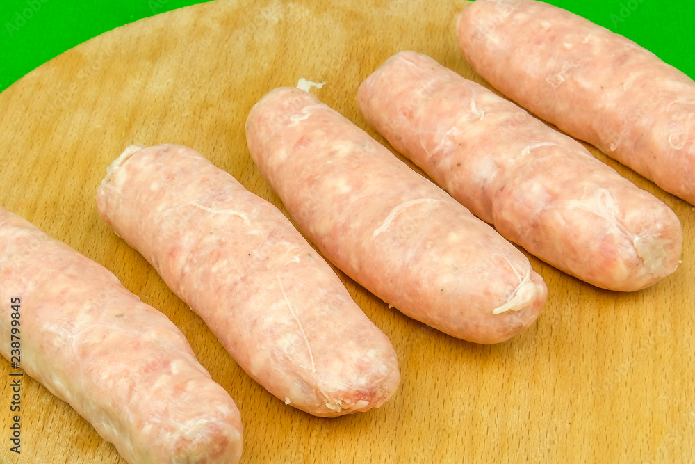 The meat frozen semi-finished for friing sausages The meat frozen semi-finished for friing sausages