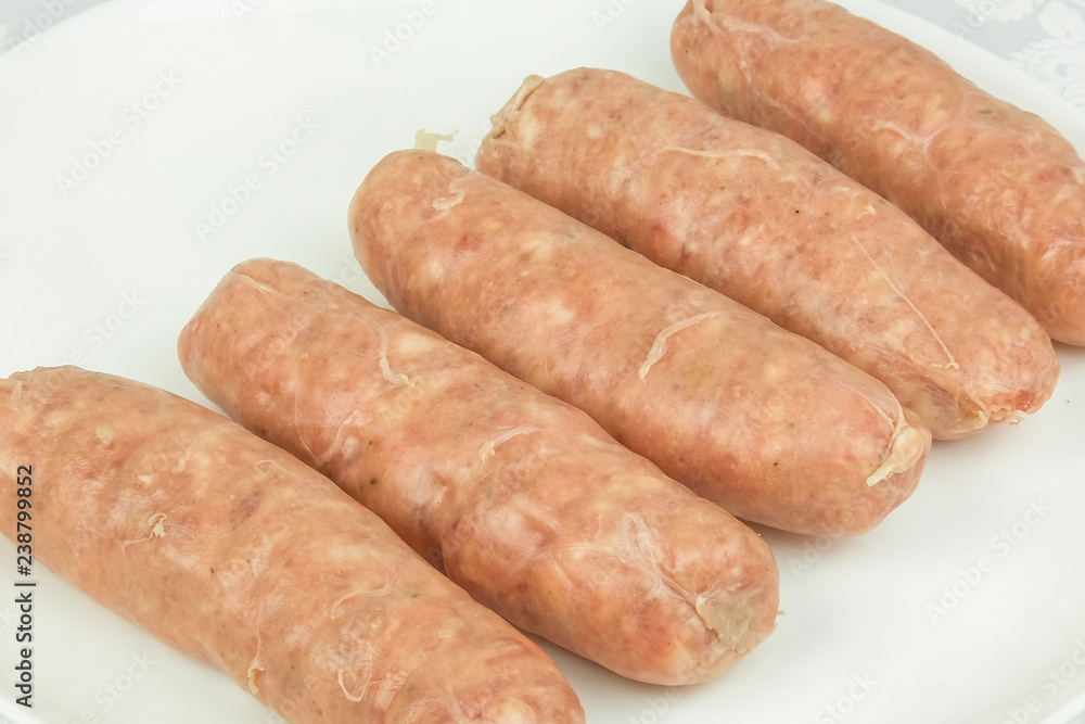 The meat frozen semi-finished for friing sausages The meat frozen semi-finished for friing sausages