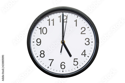 Wall clock shows time 5 o'clock on white isolated background. Round wall clock - front view. Seventeen o'clock