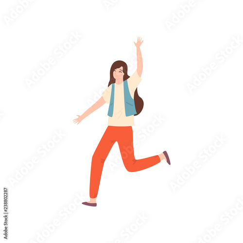 Young beautiful girl in fashionable clothes jumping from happiness and fun.
