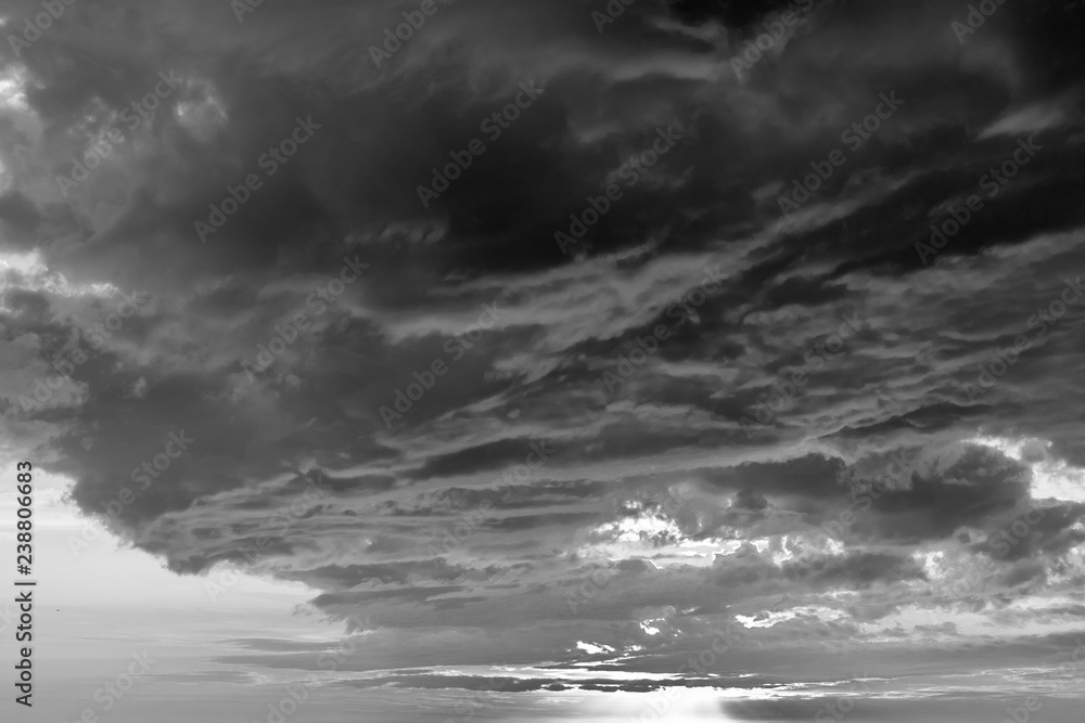 Obraz premium amazing sunset with heavy dark grey clouds