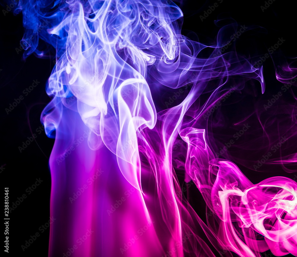Colored smoke on black background Colored smoke on black background