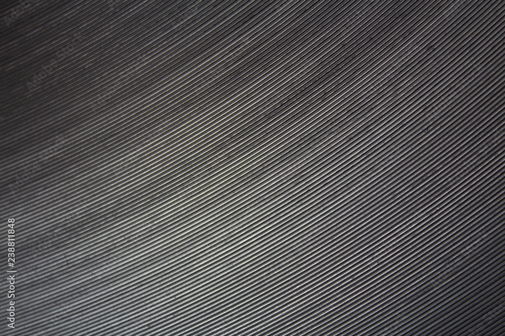 a flat aluminium is winded in a roll on a production.. a flat aluminium is winded in a roll on a production..