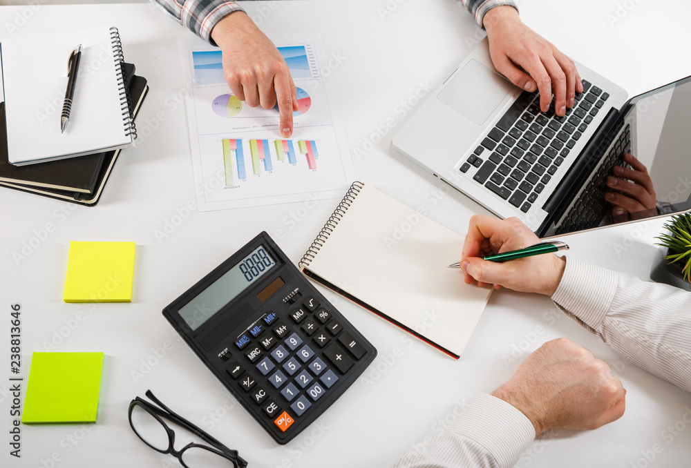 Business concept. Two business mans working and meeting with chart at office on his desk. Business concept. Two business mans working and meeting with chart at office on his desk.