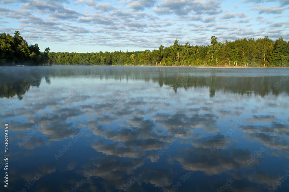 Clouds Reflected in a Calm Lake