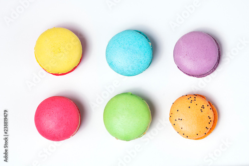 Sweet and colourful french macaroons on white background.