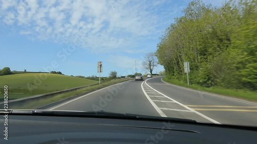 Driving on country corner in Somerset, UK. Driving north on the A367 towards Bath. Just north of the village of Dunkerton, Somerset, UK.