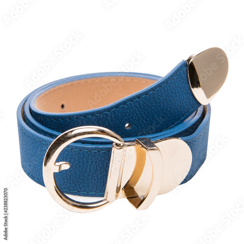 Canvas Print blue female belt with a golden shiny buckle, laid a ring on a white background