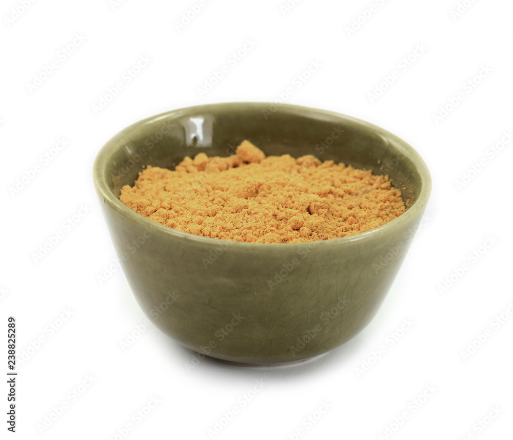 Turmeric, curcuma powder in a bowl isolated on white background. Heap of turmeric. Turmeric, curcuma powder in a bowl isolated on white background. Heap of turmeric.