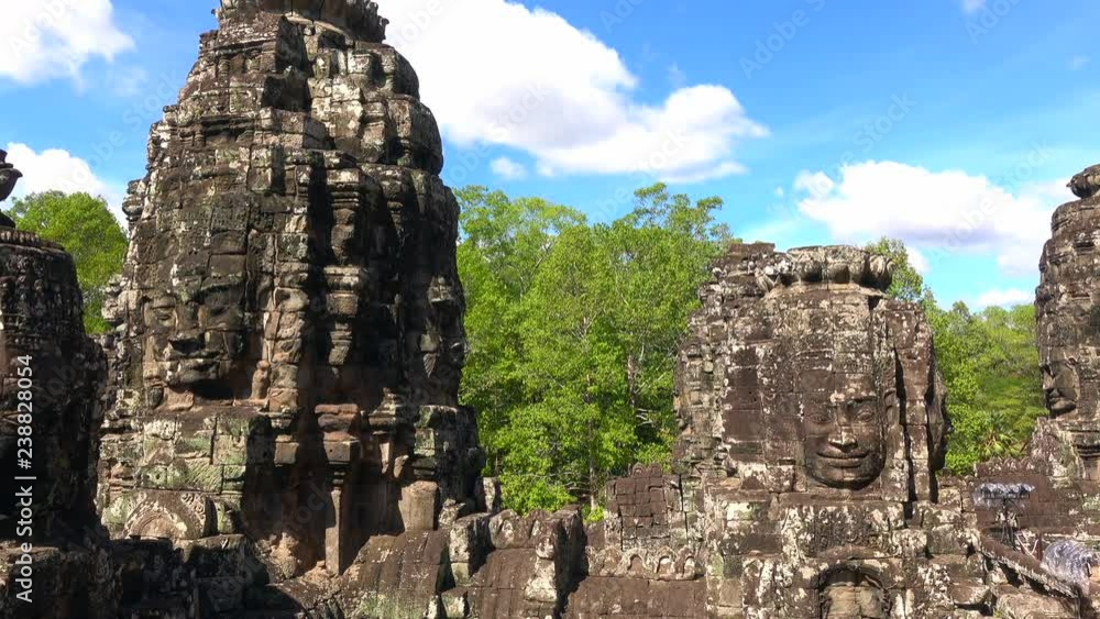Faces of Bayon temple in Angkor Thom, Siemreap, Cambodia. The Bayon Temple (Prasat Bayon ) is a richly decorated Khmer temple at Angkor , ancient architecture in Cambodia Faces of Bayon temple in Angkor Thom, Siemreap, Cambodia. The Bayon Temple (Prasat Bayon ) is a richly decorated Khmer temple at Angkor , ancient architecture in Cambodia