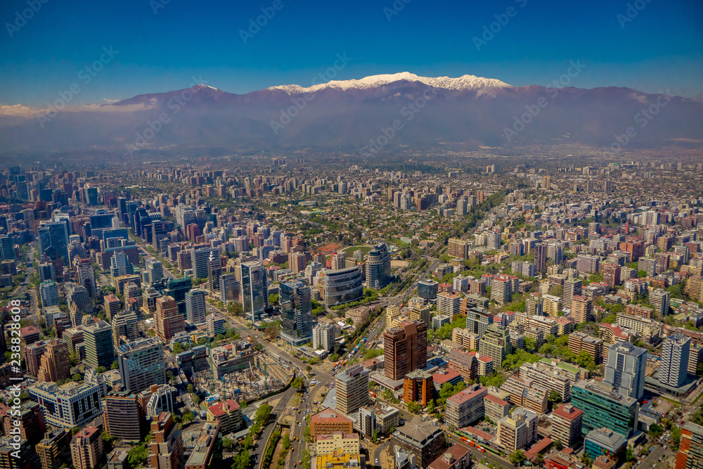 Gorgeous view of Santiago with a snowy mountain in the horizont viewed from Cerro San Cristobal, Chile
