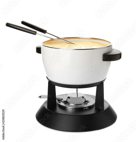Pot with delicious cheese fondue and forks on white background