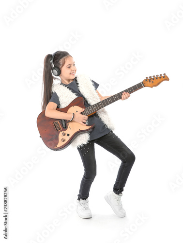 Emotional little girl playing guitar, isolated on white