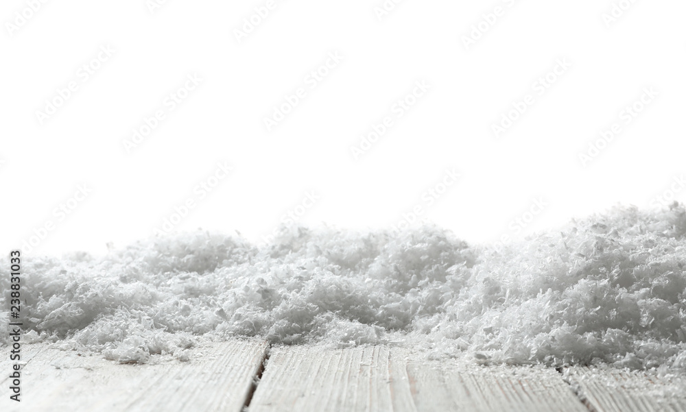 Fototapeta premium Wooden surface covered with snow against white background