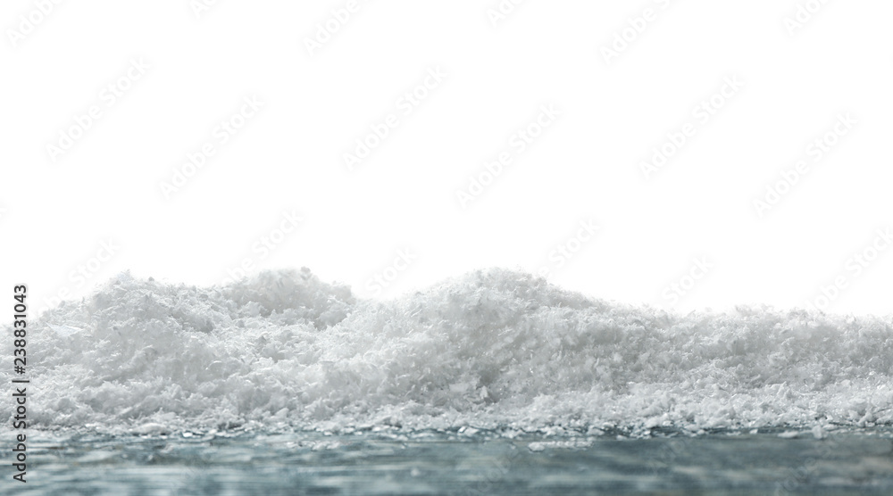 Wooden surface covered with snow against white background