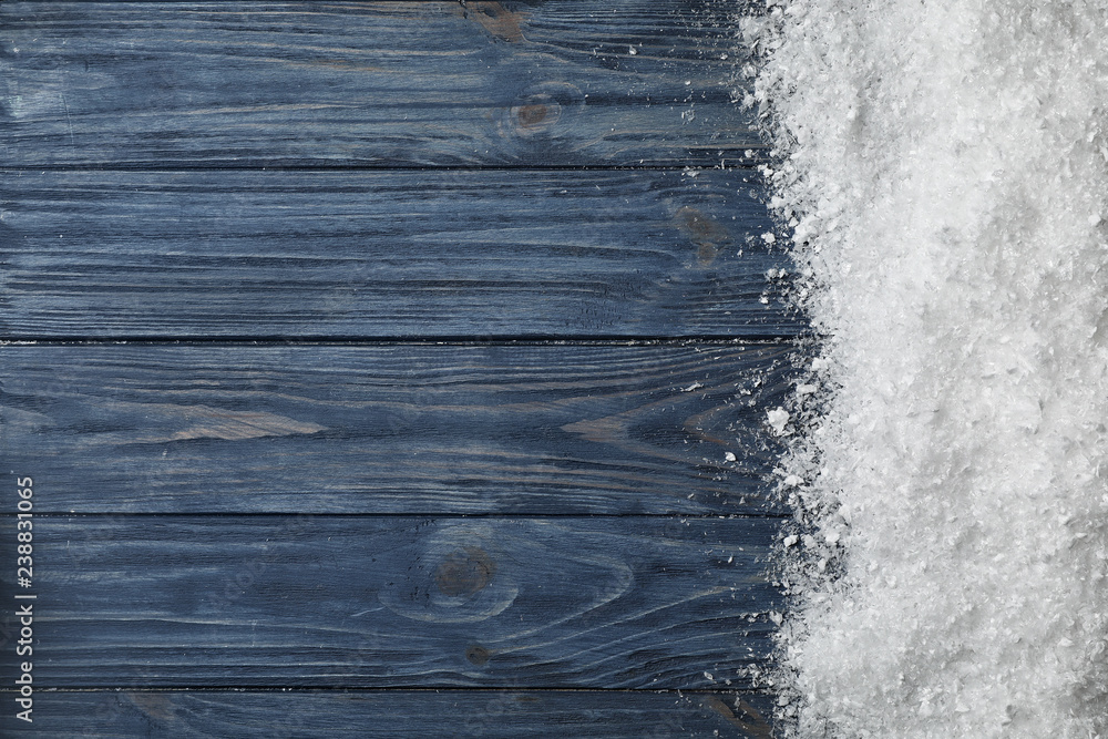 White snow and space for text on wooden background, top view - obrazy, fototapety, plakaty 