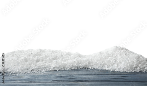 Wooden surface covered with snow against white background