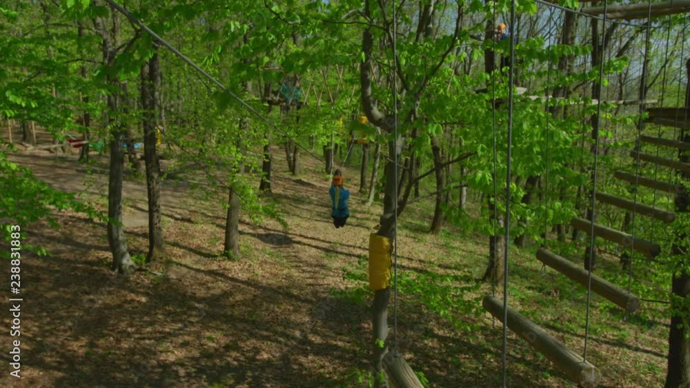 Blonde woman on a zip line