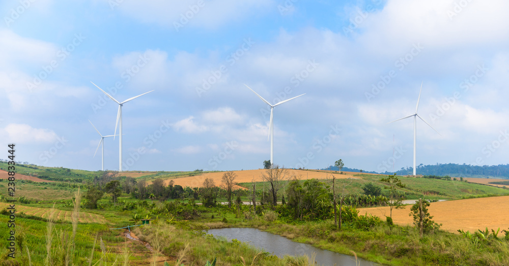 Windmill turbine field for electric production at Khao Kho, Petchabun, Thailand Windmill turbine field for electric production at Khao Kho, Petchabun, Thailand