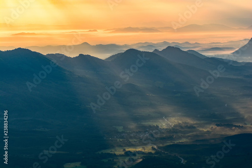 Sun rise in the morning new day   Wonderful landscape sunrise on hill mountain with rays of sunlight shining