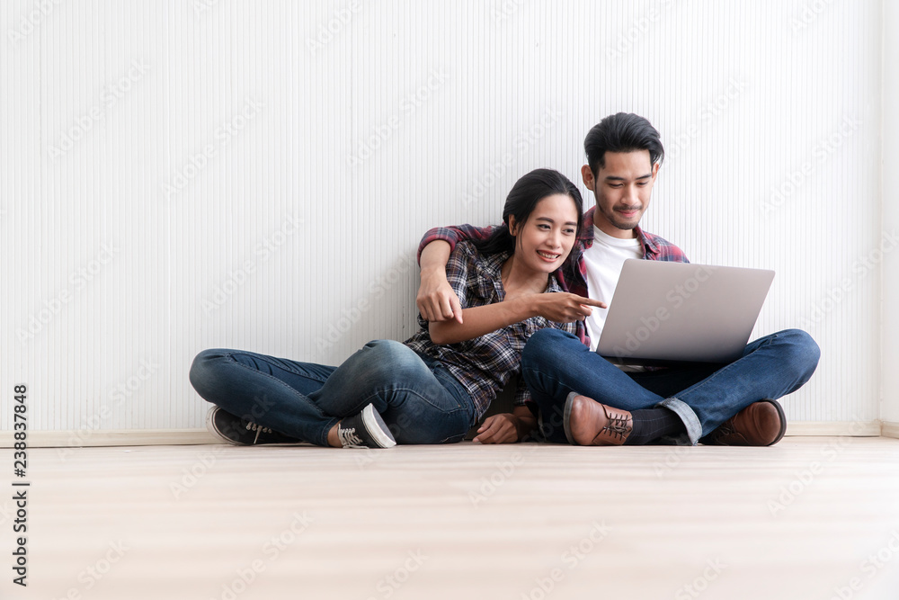 Asian Couple.Couple or collegian using online for search information on a PC. Couple using laptop, close to each other. Asian people internet, technology, family, love, relationship, happiness concept Asian Couple.Couple or collegian using online for search information on a PC. Couple using laptop, close to each other. Asian people internet, technology, family, love, relationship, happiness concept