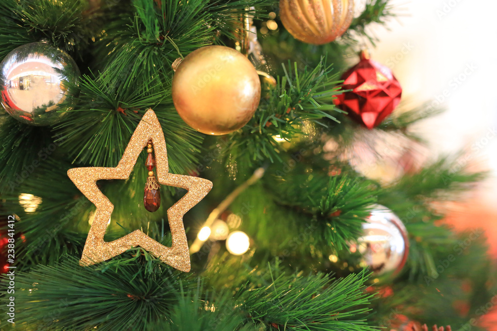 Christmas tree with decorative items for Xmas time and winter season background. Christmas tree with decorative items for Xmas time and winter season background.