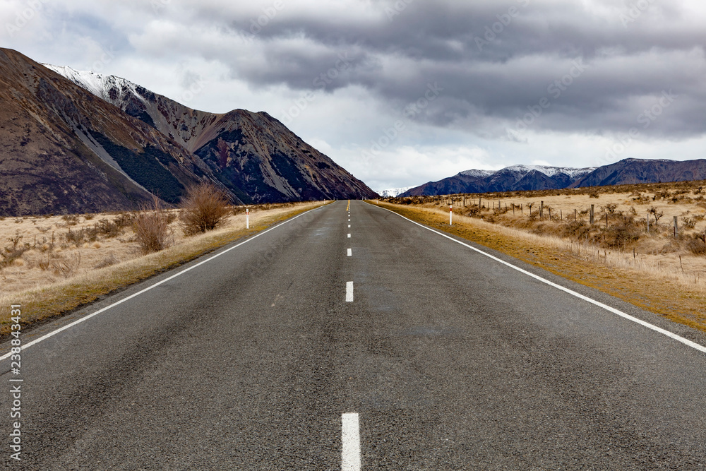 Naklejka premium straight highway in arthur's pass national park one of most popular traveling destination in new zealand