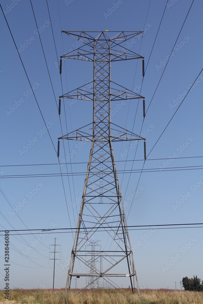 power transmission tower on background of blue sky