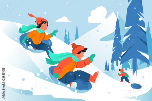 Kids with ice floe ride down the hill in forest.