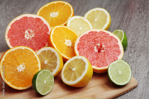 Mix of citrus fruits cut in different forms 