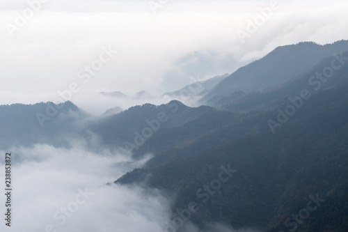 clouds and mists drifting in the valley