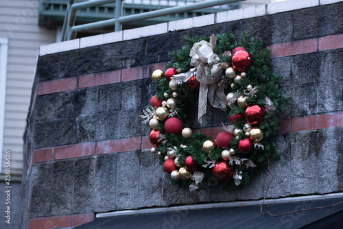 Artificial Christmas wreath on the side of the building in downtown Portland, Oregon.