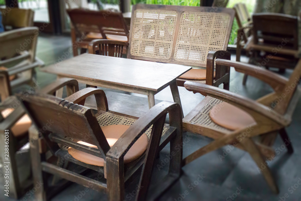 Vintage wooden furniture in loft cafe