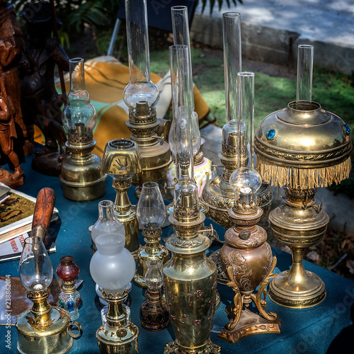 Flea market in the open./Flea market in the open. Antique kerosene lamps of various designs, manufacturers and years of manufacture.