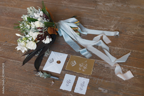 Wonderful luxury wedding bouquet of different flowers. Wedding card design. Postal card design. Sealing wax stamp. Golden background. Calligraphic design elements.