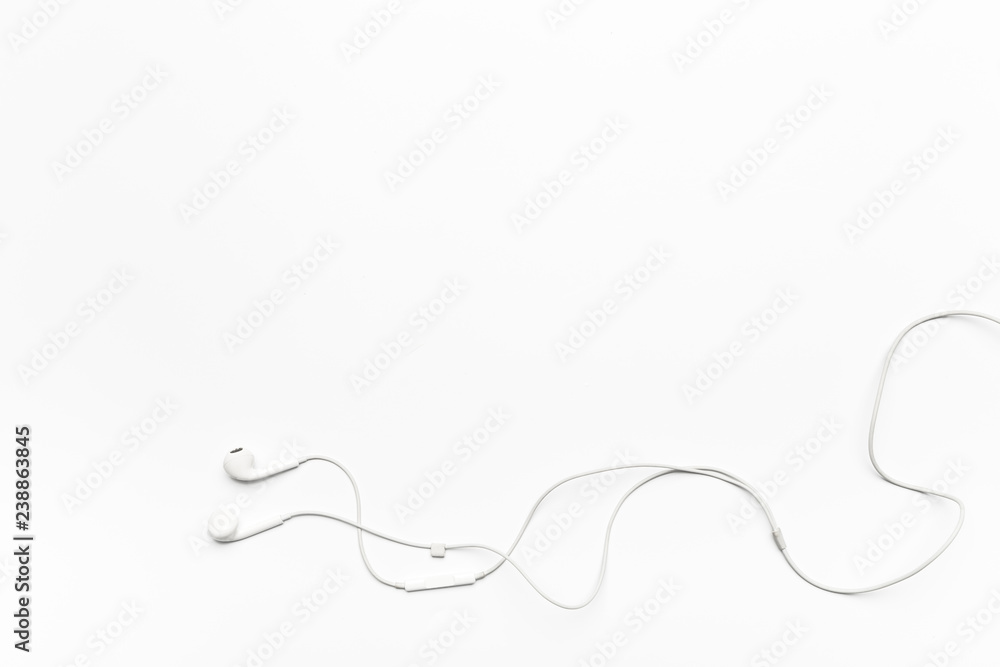 white Earphones isolated on white background white Earphones isolated on white background
