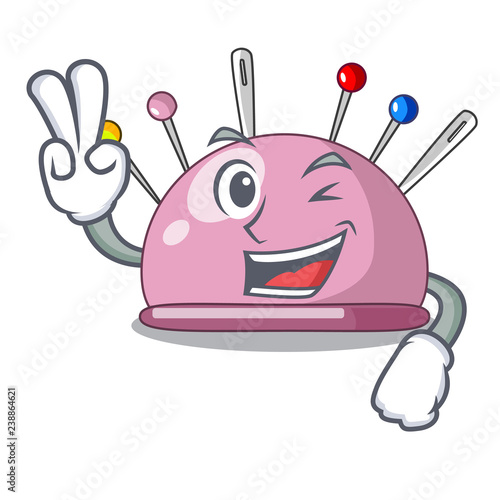 Two finger pincushion with a character needles icon