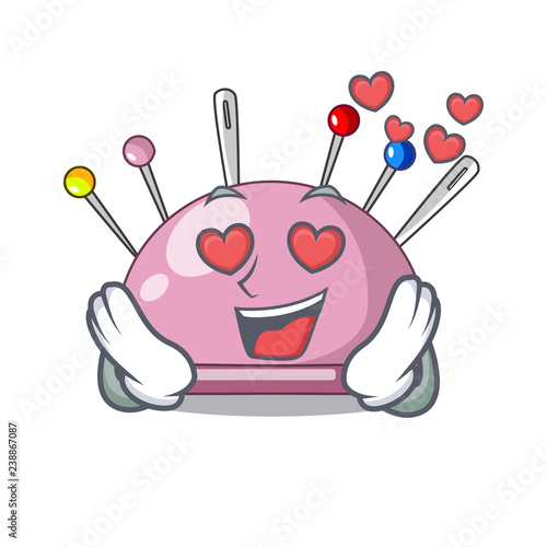 In love sewing pins and pincushion on mascot