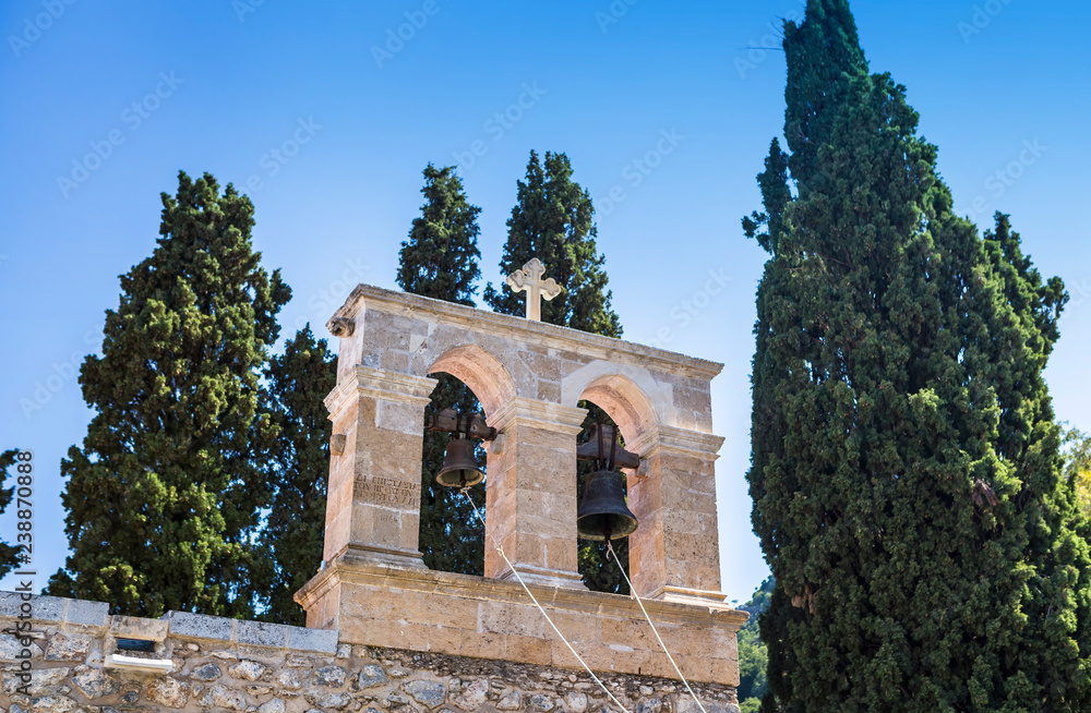 Bell tower of monastery Kera Kardiotissa in the mountains of Crete. Greece