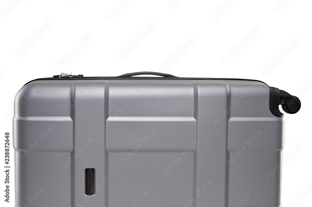 Fragment of gray plastic valise on wheels isolated on white background Fragment of gray plastic valise on wheels isolated on white background