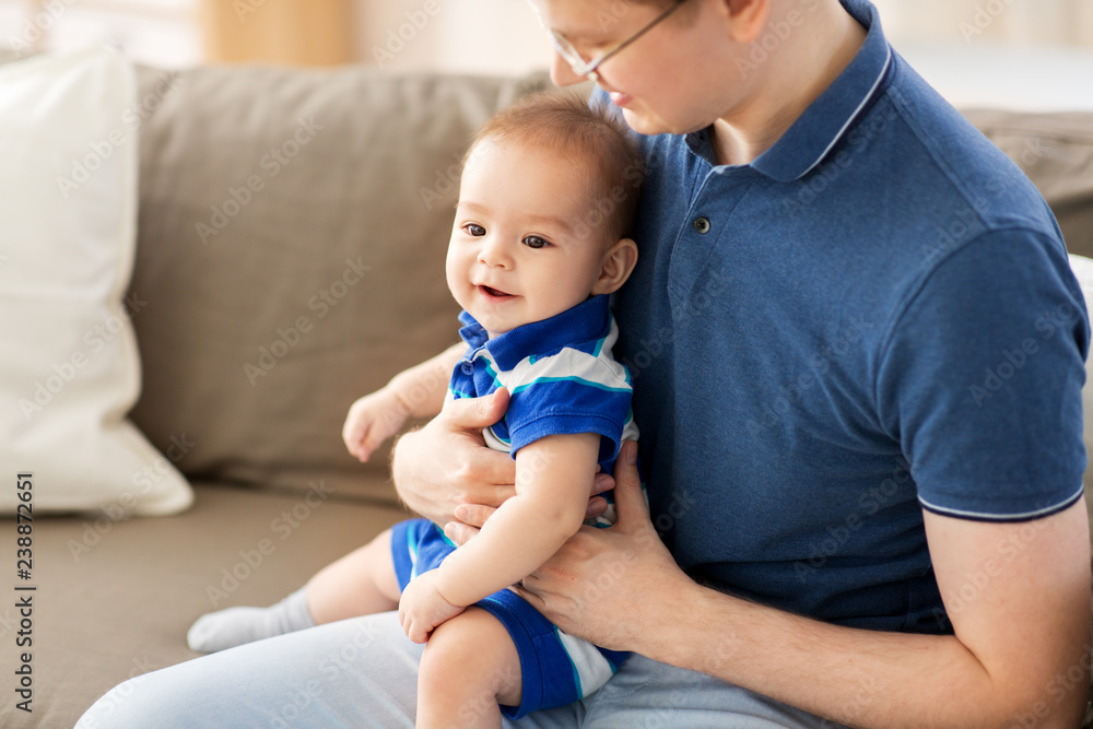family, fatherhood and childhood concept - happy father with baby son at home family, fatherhood and childhood concept - happy father with baby son at home