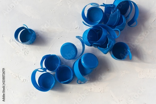 Foto water demijohn caps collected for recycling
