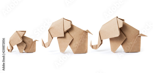 Brown paper elephant family in origami tehnique isolated on white background with clipping path