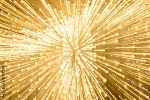 long exposure of blurred shiny golden bokeh lights