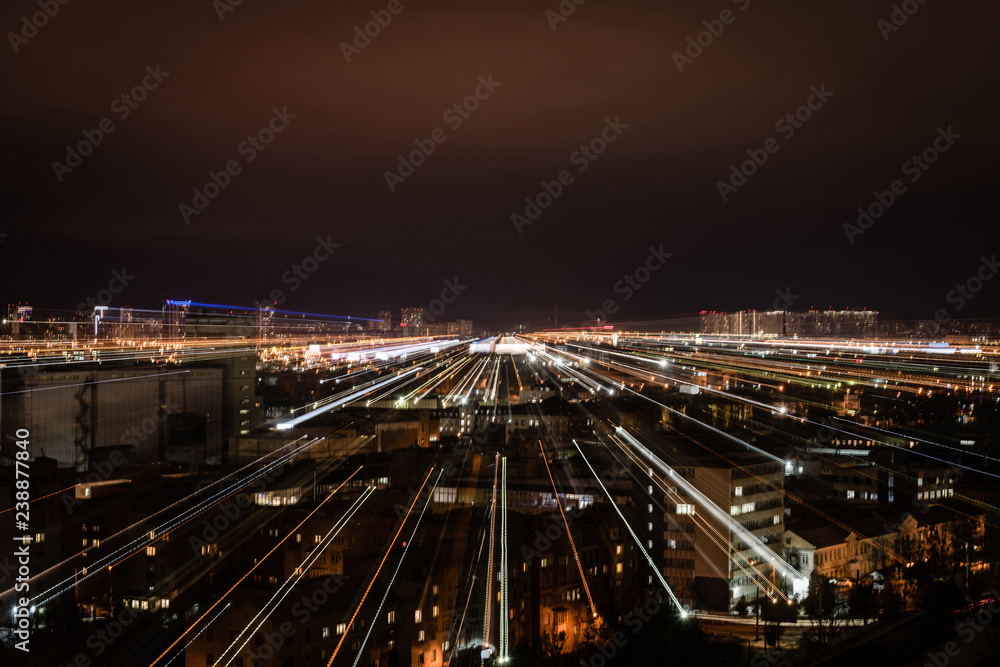 night cityscape with blurred bright illumination