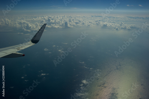 Flyin above clouds and sea