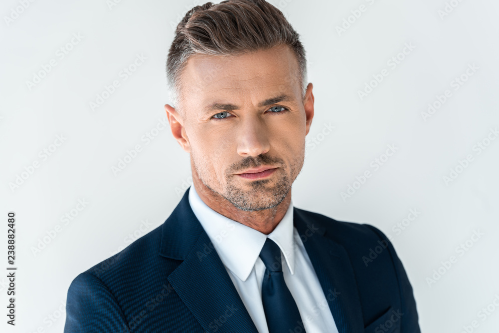 portrait of handsome businessman looking at camera isolated on white portrait of handsome businessman looking at camera isolated on white