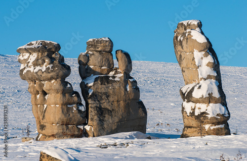 Ostantsy - an isolated array of rock, remaining after the destruction of the unstable part: the formation, weathering, rock remnants. Yakutia. Russia