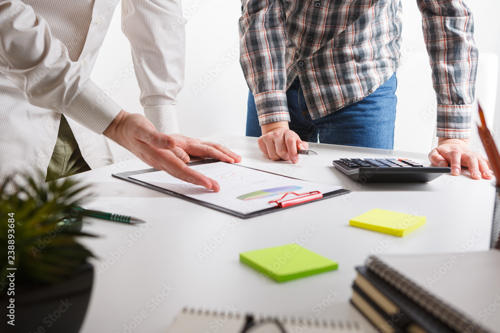 Business concept. Two business mans working and meeting with chart at office on his desk. Business concept. Two business mans working and meeting with chart at office on his desk.